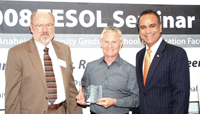 Anaheim City Councilman Harry Sidhu (right) presents award to Anaheim Univeristy Dean fo the Graduate School of Education Dr. David Nunan (Center) and Anaheim University President Dr. William Hartley (Left)