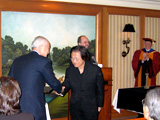 Dr. Kurokawa shaking hands with Dr. Shinji Fukukawa