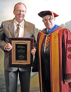 AU Chair of the Board of Advisors, Dr Clive Grafton and Citigroup Vice-President for Training, Larry Purdy