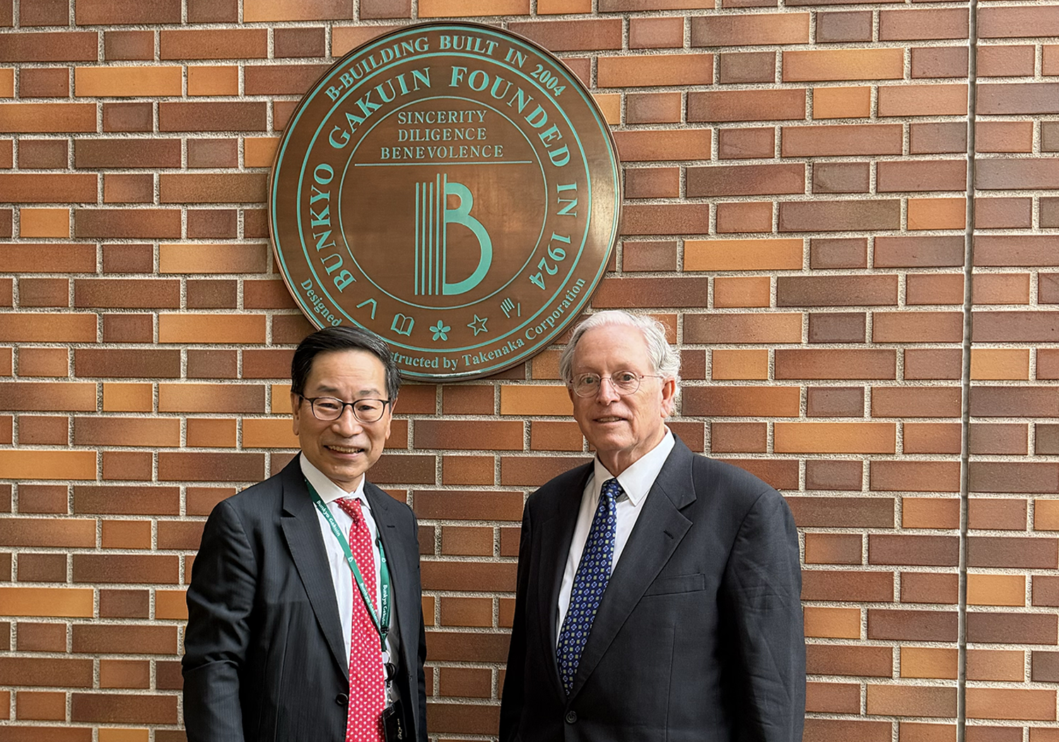 Bunkyo Gakuin University Chancellor Masakazu Shimada with Anaheim University Chancellor Peter Langenberg
